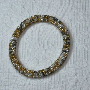 Elegant Gold and Silver Beaded Bracelet
